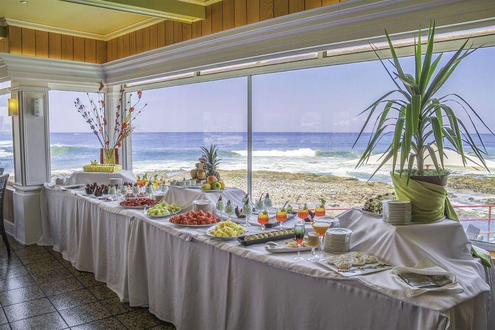 Hotel Gavina Costa Mar Iquique Esterno foto A buffet at a hotel